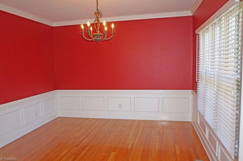 5250 Mountain View Road Winston-Salem, NC 27104 - Photo 12 of 26 Dining w/detailed wainscoting & crown molding.