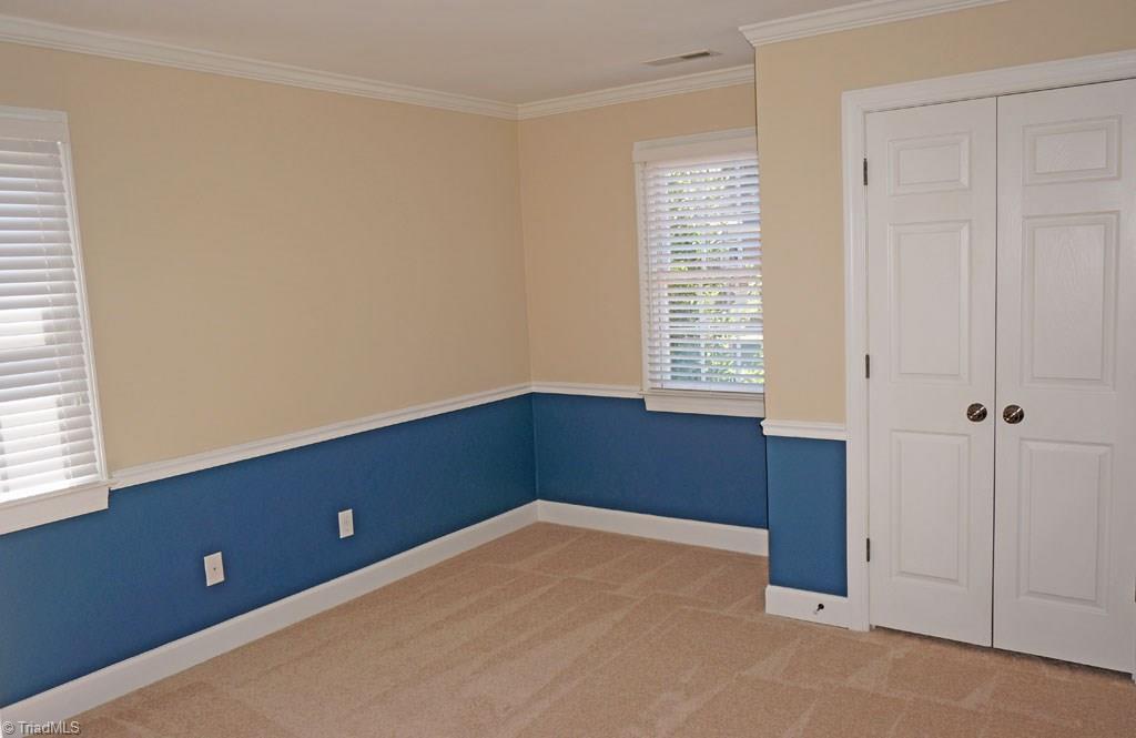 5250 Mountain View Road Winston-Salem, NC 27104 - Photo 13 of 26 Bedroom with detail chair rail.