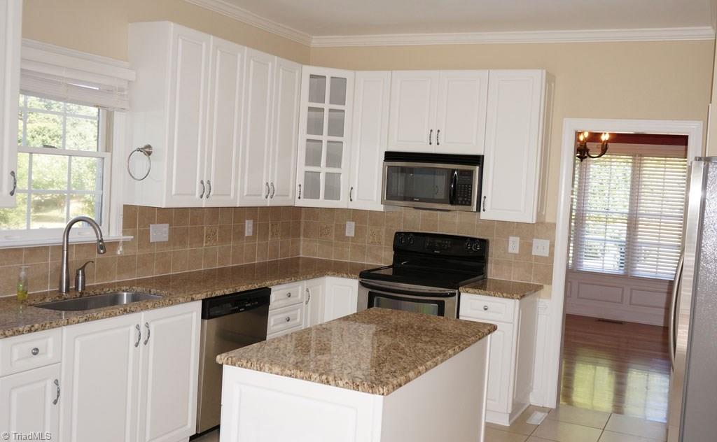 5250 Mountain View Road Winston-Salem, NC 27104 - Photo 7 of 26 Spacious kitchen w/granite top & tile floors.