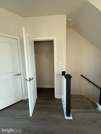 a view of entryway with wooden floor