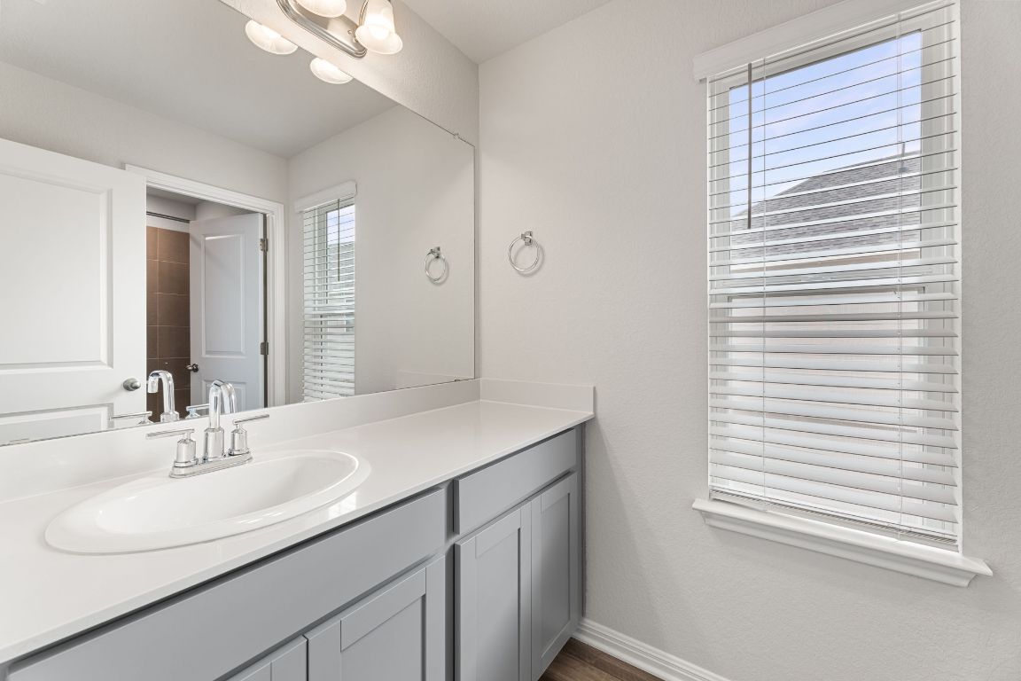 354 Lost Mine Peak Lane Dripping Springs, TX 78620 - Photo 16 of 26 Full bathroom upstairs.