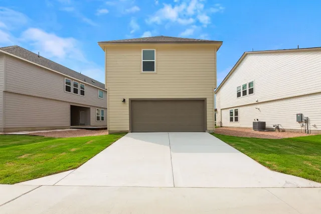 a front view of house with yard