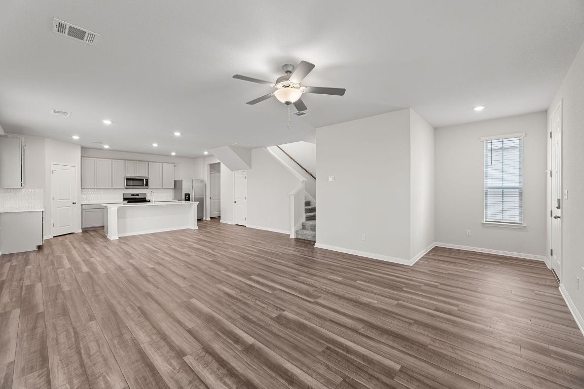 354 Lost Mine Peak Lane Dripping Springs, TX 78620 - Photo 4 of 26 Large living room downstairs.