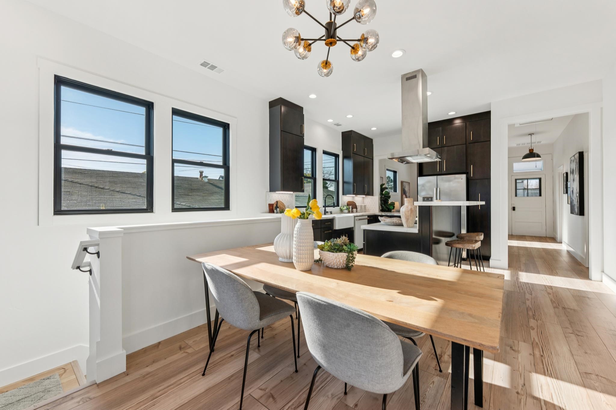 1308 Court Street Alameda, CA 94501 - Photo 37 of 60 Dining room featuring light wood finished floors, plenty of natural light, and suspended lighting