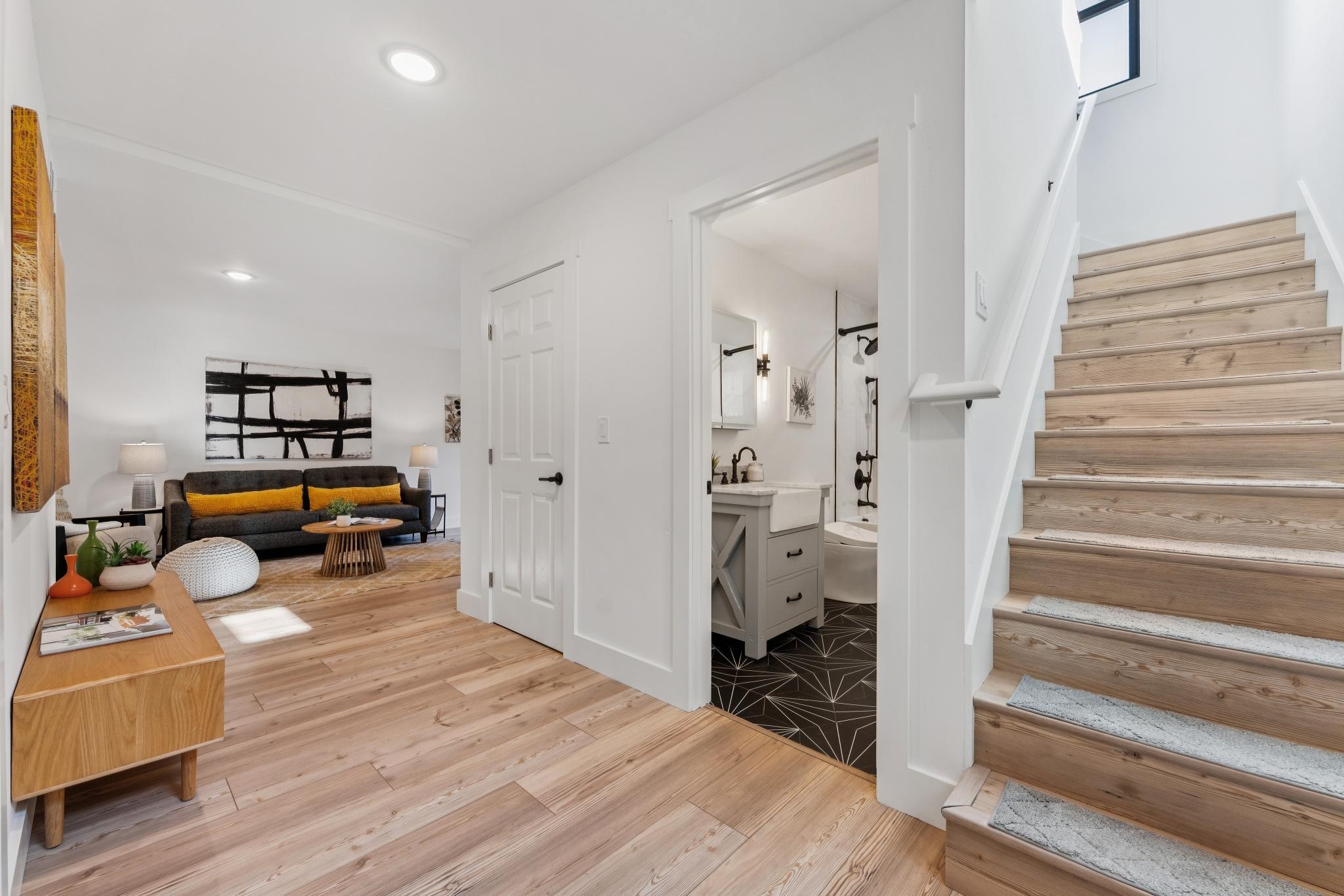1308 Court Street Alameda, CA 94501 - Photo 38 of 60 Staircase featuring hardwood / wood-style flooring and recessed lighting