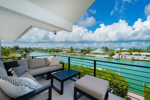 a workspace with furniture and a window