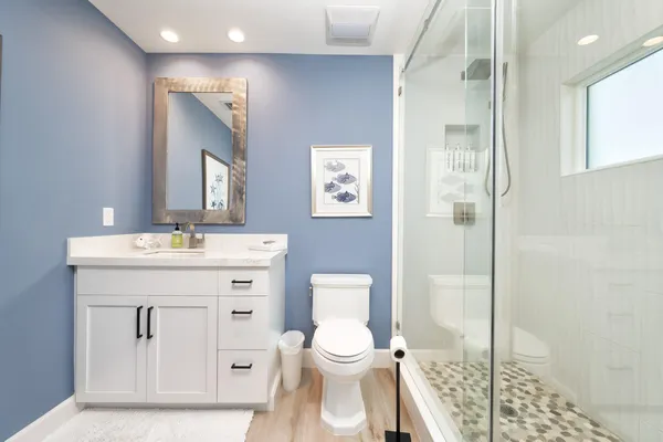 a view of a kitchen with a large window