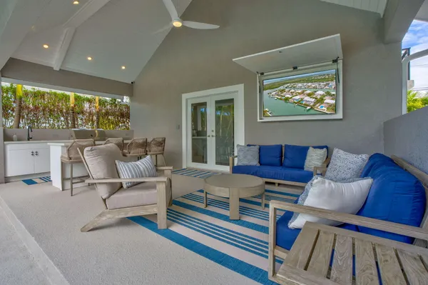 a picture of a bench in front of a wall