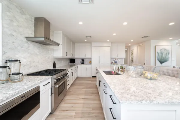 a view of a dining area with furniture and wooden floor