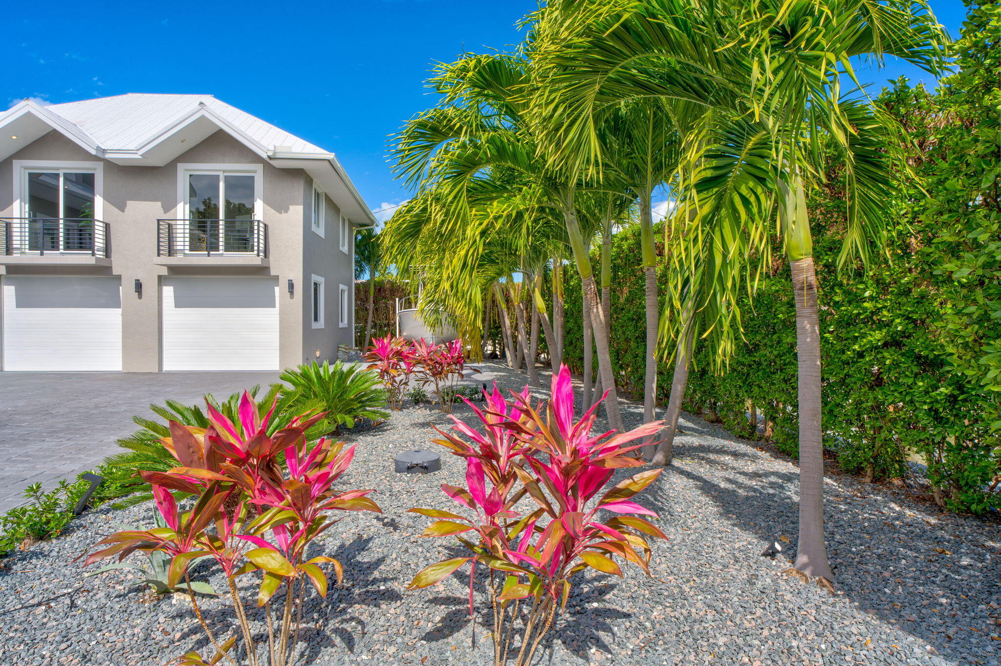 116 Ave G Marathon, FL 33050 - Photo 65 of 80 a front view of a house with a yard and fountain