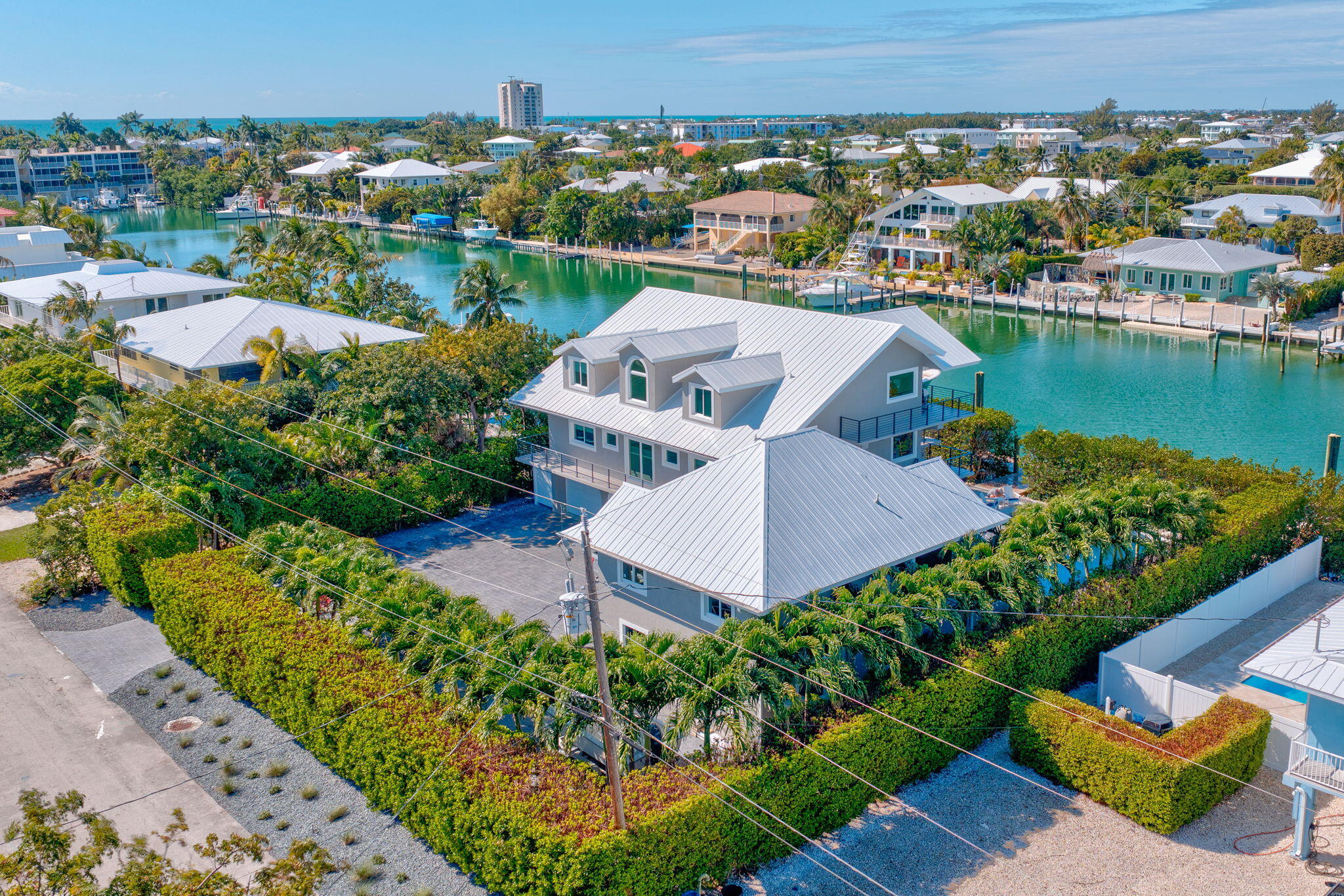 116 Ave G Marathon, FL 33050 - Photo 71 of 80 an aerial view of a house with a garden and lake view