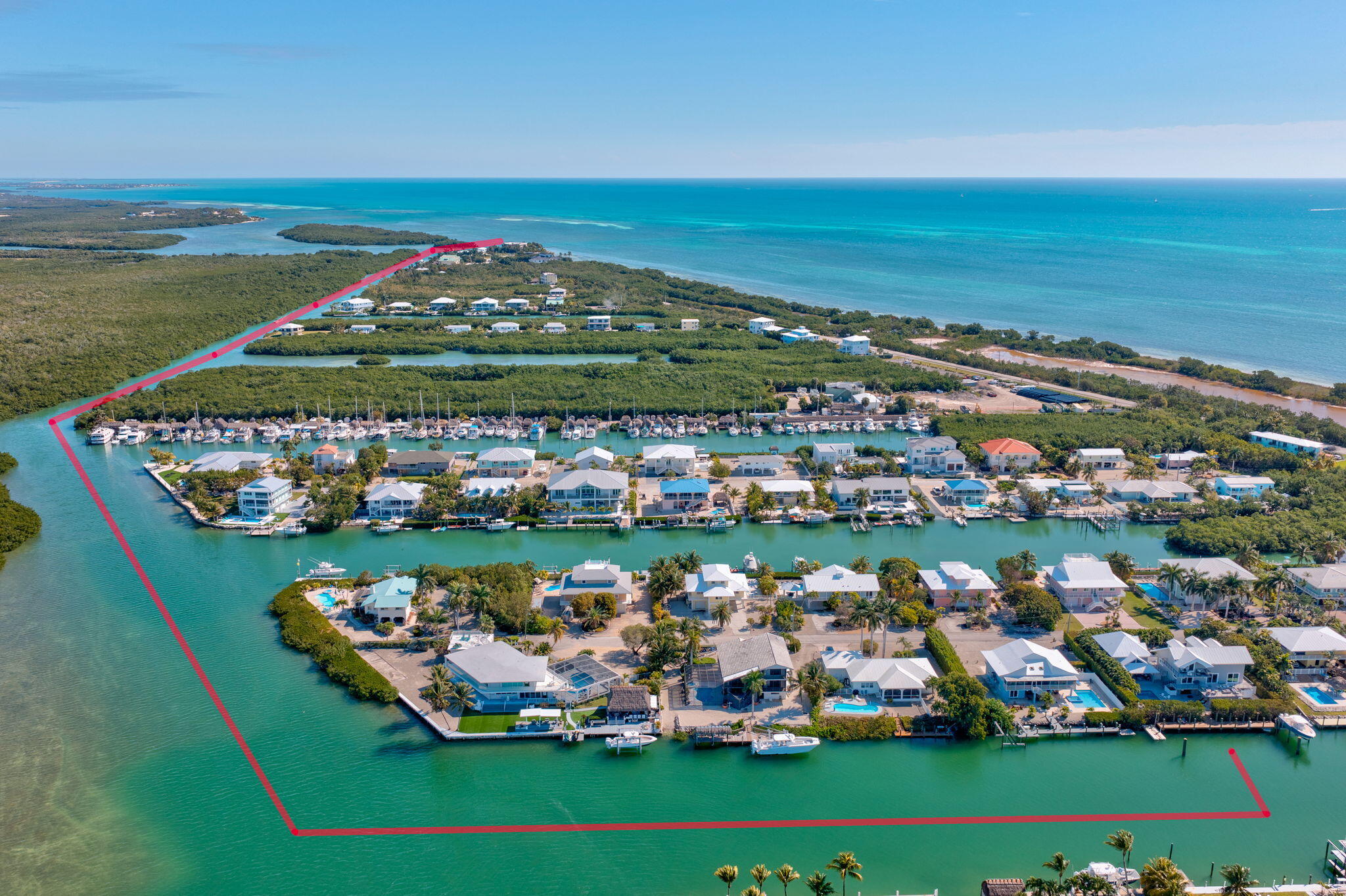 116 Ave G Marathon, FL 33050 - Photo 76 of 80 a view of a city with lots of residential buildings ocean and mountain view in back