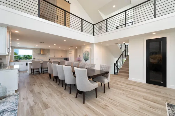 a view of a patio with couches chairs and potted plants