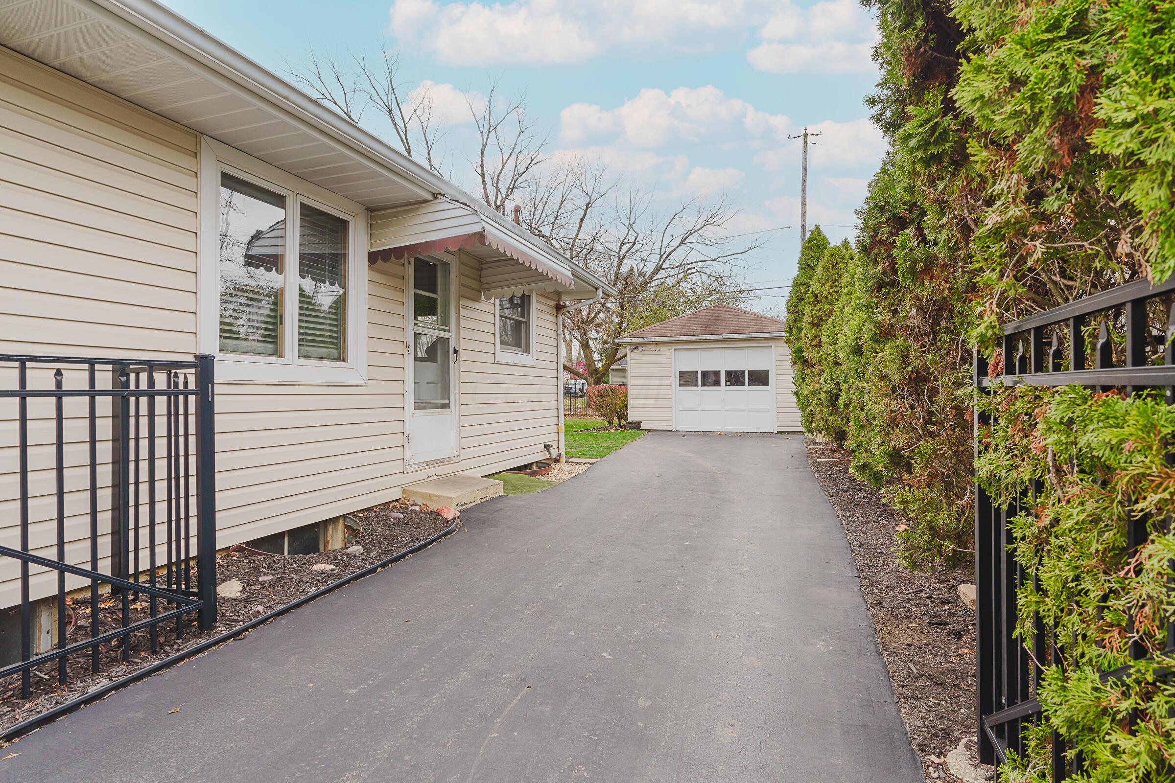 2063 Milden Road Columbus, OH 43221 - Photo 4 of 41 Gated driveway with side entrance into kitchen & detached garage