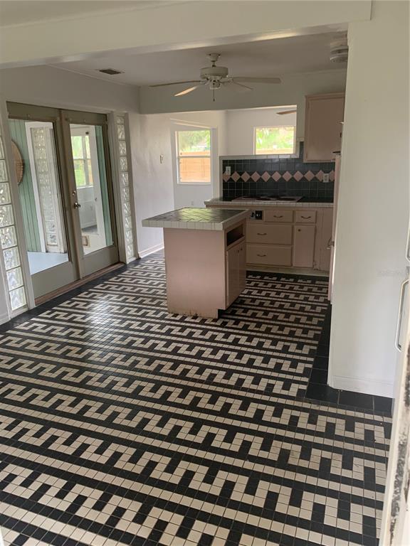 1063 40th Street Sarasota, FL 34234 - Photo 5 of 13 a kitchen with a sink and a window
