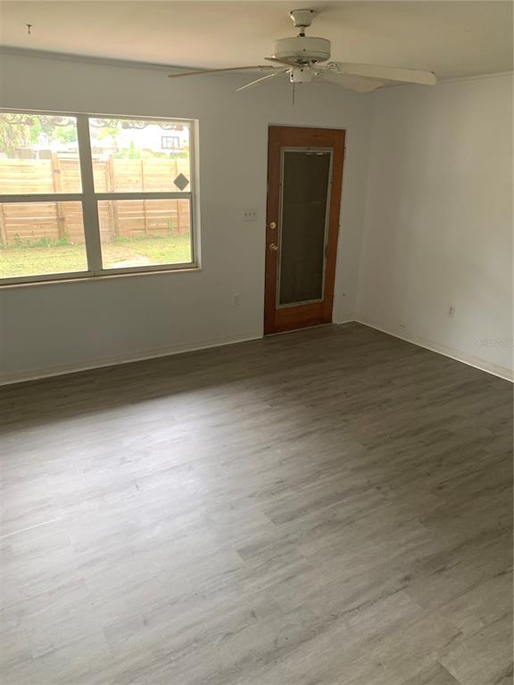 1063 40th Street Sarasota, FL 34234 - Photo 9 of 13 an empty room with a window