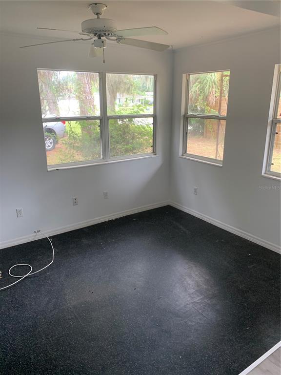 1063 40th Street Sarasota, FL 34234 - Photo 10 of 13 an empty room with a window