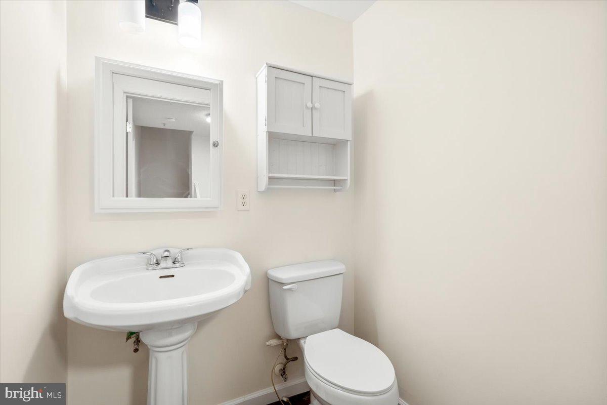 6570 Ellington Way Frederick, MD 21703 - Photo 28 of 39 Lower level half bath