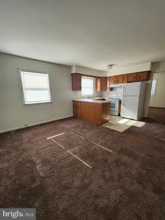 a view of livingroom with furniture and window
