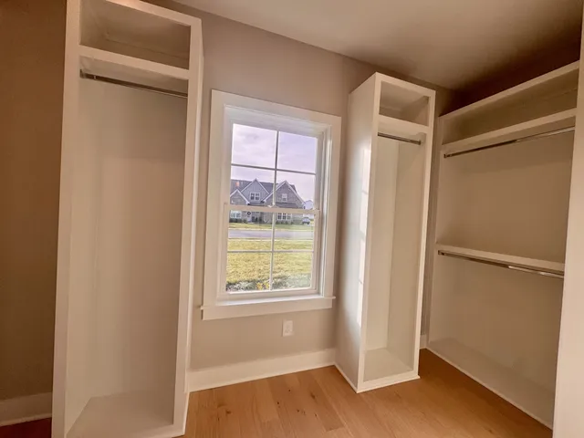 a view of walk in closet with window