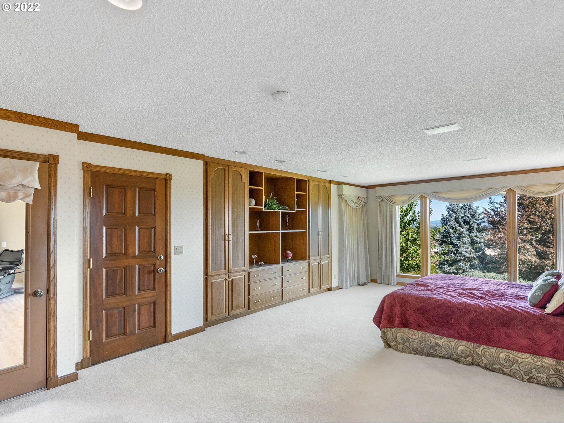 38000 Southwest Nursery Road Cornelius, OR 97113 - Photo 11 of 40 a bedroom with a bed and a large window