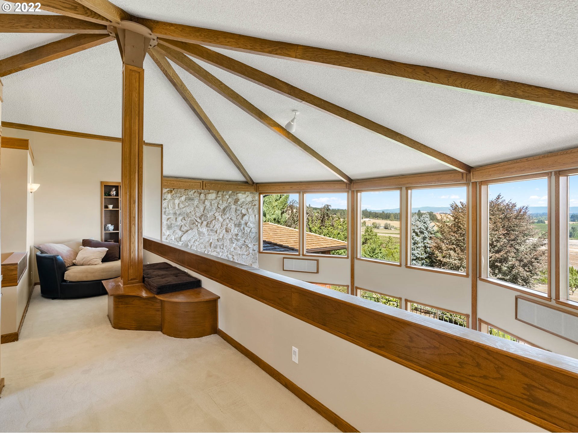 38000 Southwest Nursery Road Cornelius, OR 97113 - Photo 18 of 40 a view of a living room with a floor to ceiling window and an outdoor view