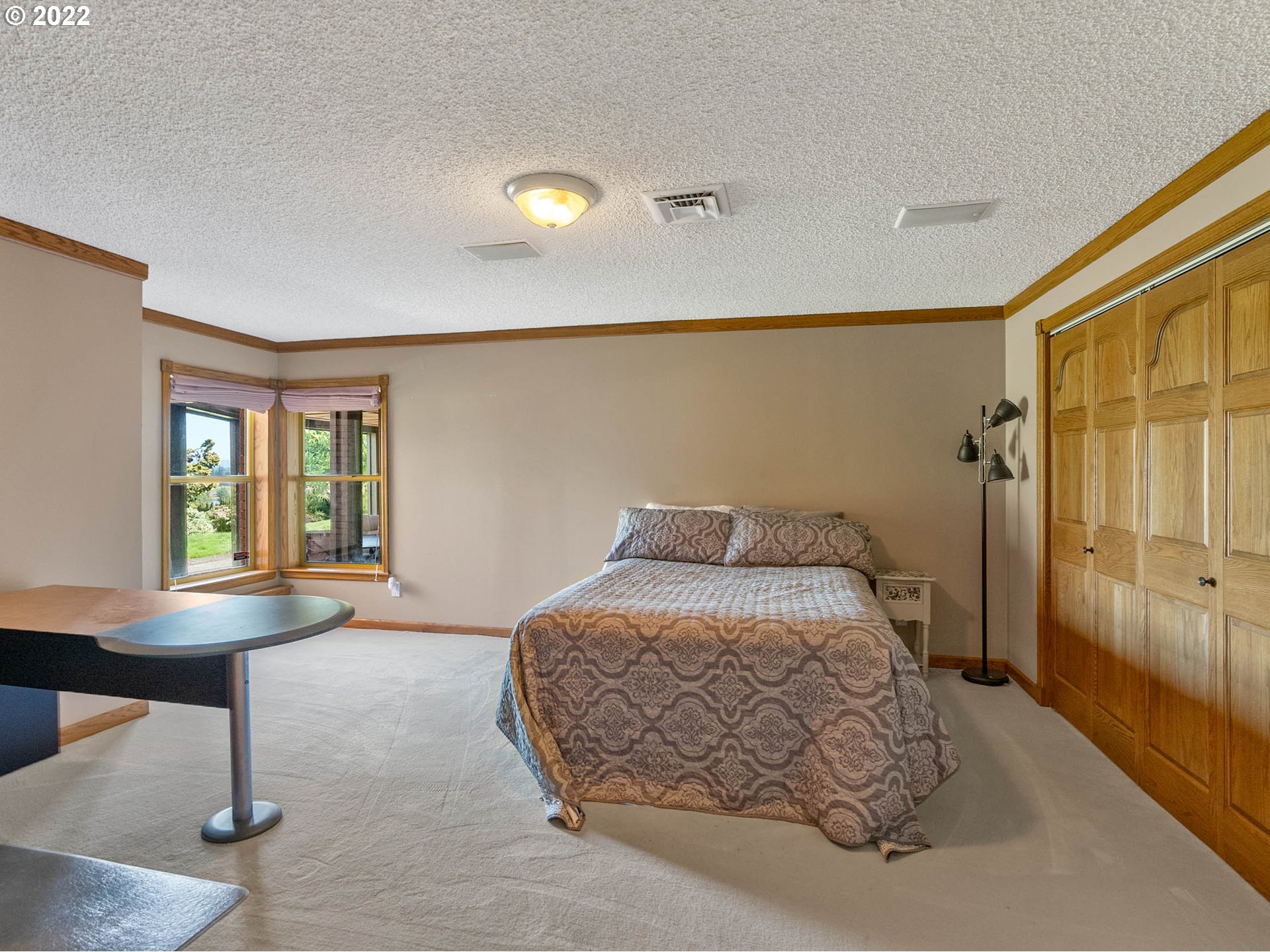38000 Southwest Nursery Road Cornelius, OR 97113 - Photo 24 of 40 a bedroom with a bed and window