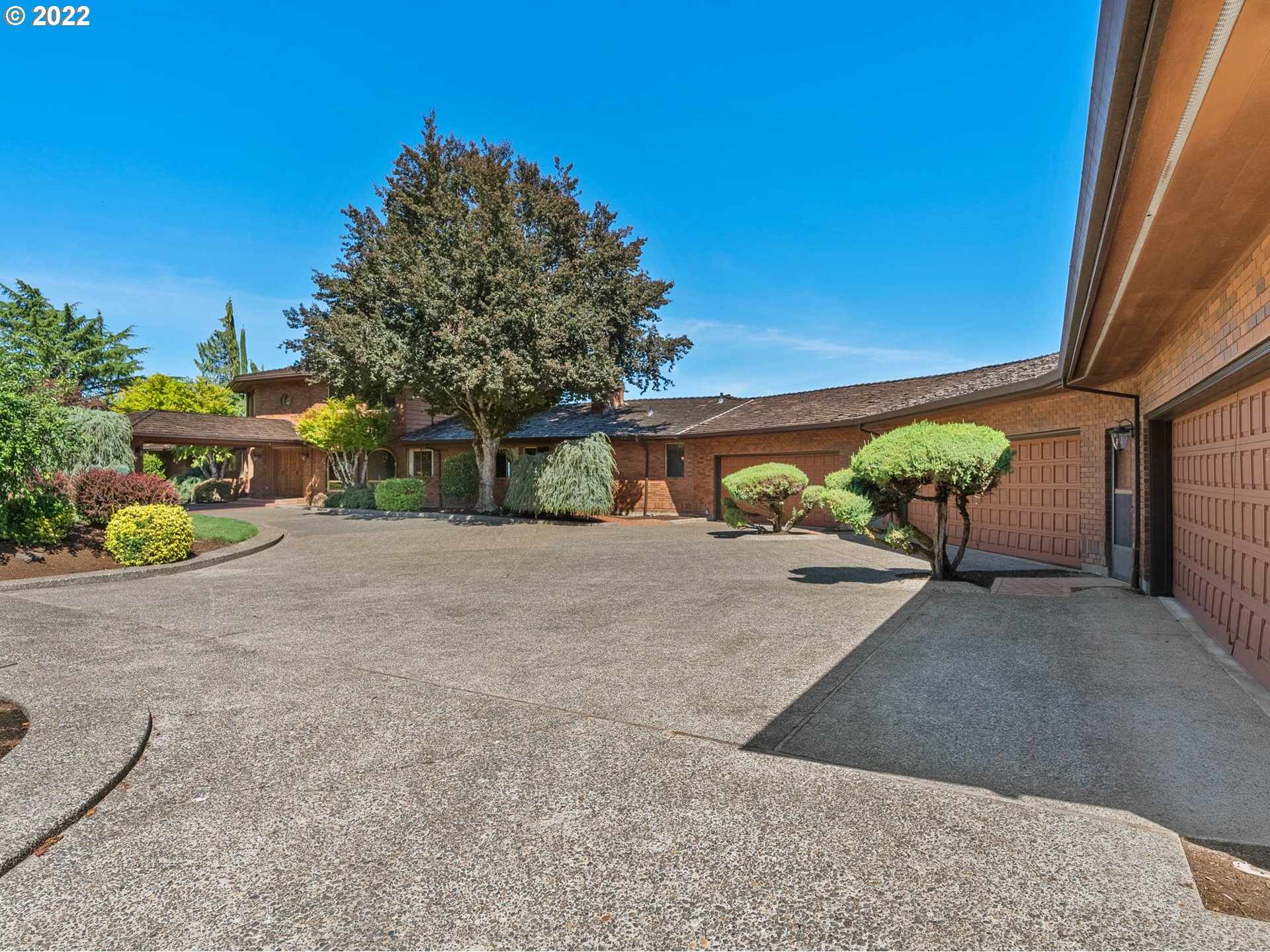 38000 Southwest Nursery Road Cornelius, OR 97113 - Photo 28 of 40 a view of a house with potted plants and large trees