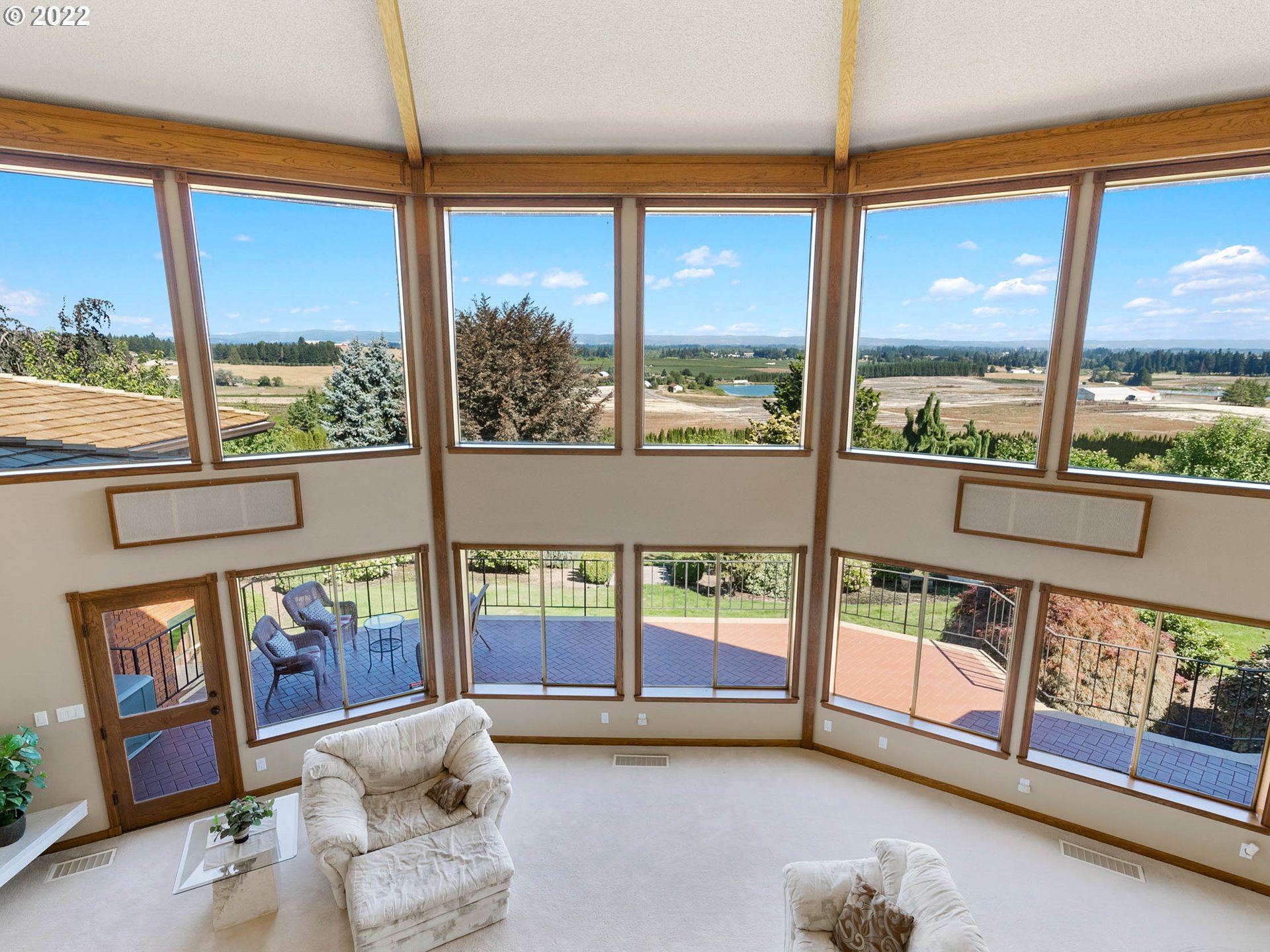 38000 Southwest Nursery Road Cornelius, OR 97113 - Photo 6 of 40 a living room with glass windows and furniture