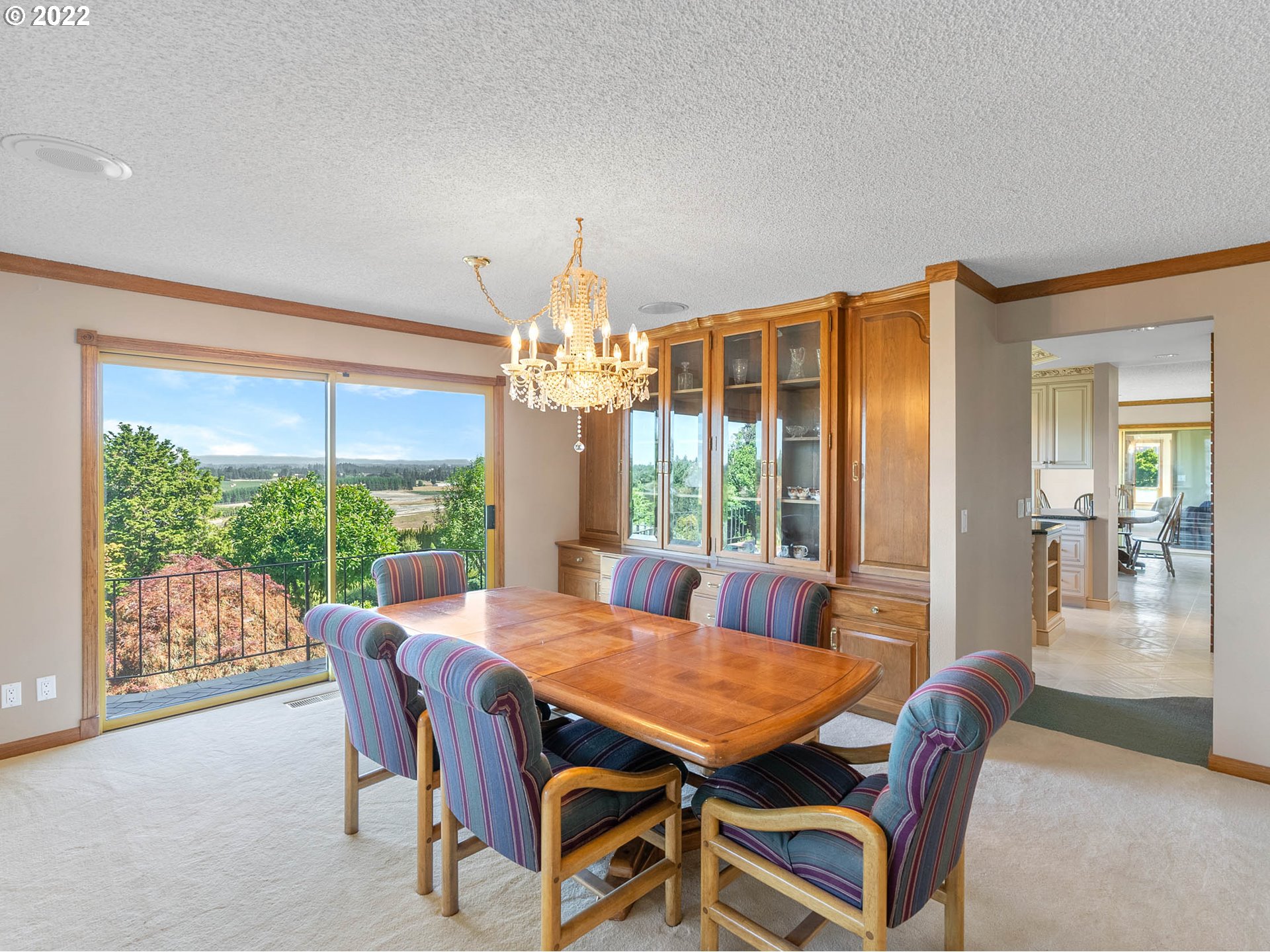 38000 Southwest Nursery Road Cornelius, OR 97113 - Photo 7 of 40 a view of a dining room with furniture wooden floor and chandelier