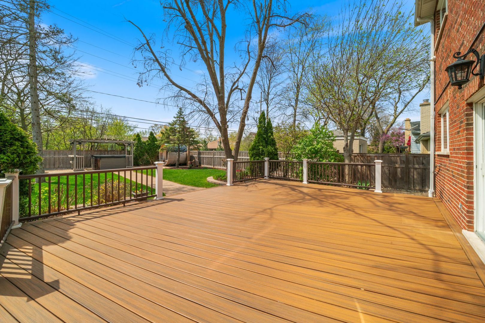 701 Oakton Street Park Ridge, IL 60068 - Photo 49 of 59 a view of a backyard with wooden fence