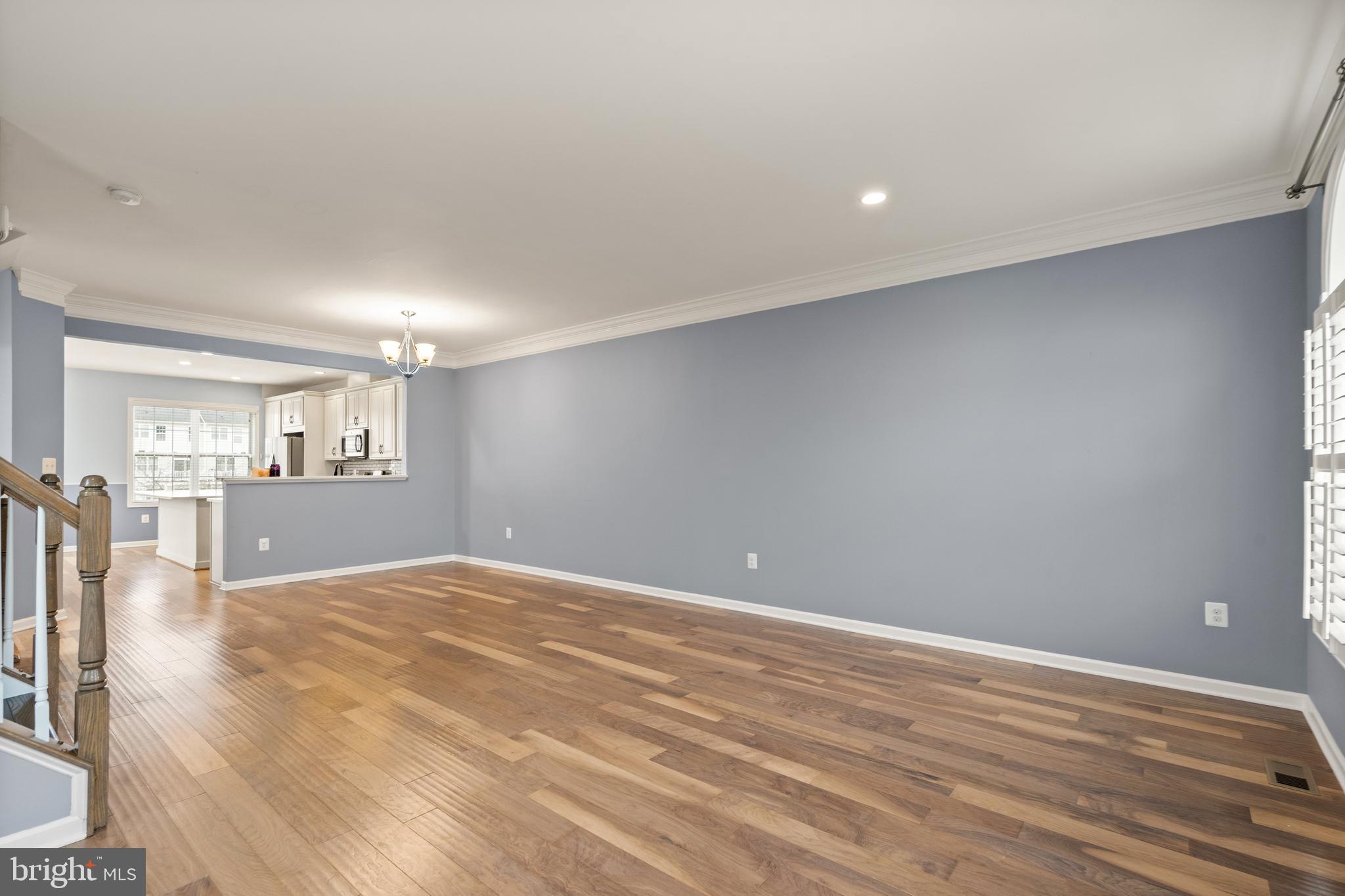 42988 Atoka Manor Terrace Ashburn, VA 20148 - Photo 14 of 47 a view of empty room with wooden floor