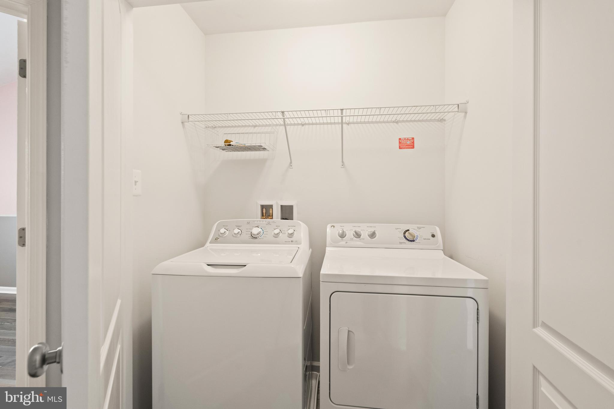 42988 Atoka Manor Terrace Ashburn, VA 20148 - Photo 28 of 47 a utility room with dryer and washer