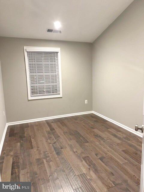 42988 Atoka Manor Terrace Ashburn, VA 20148 - Photo 38 of 47 an empty room with wooden floor and windows
