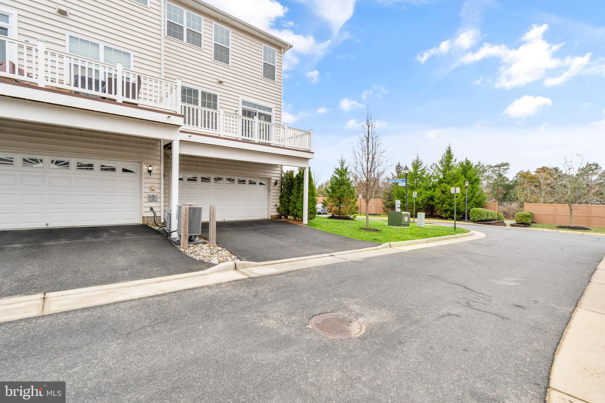 42988 Atoka Manor Terrace Ashburn, VA 20148 - Photo 43 of 47 a view of a building with a yard