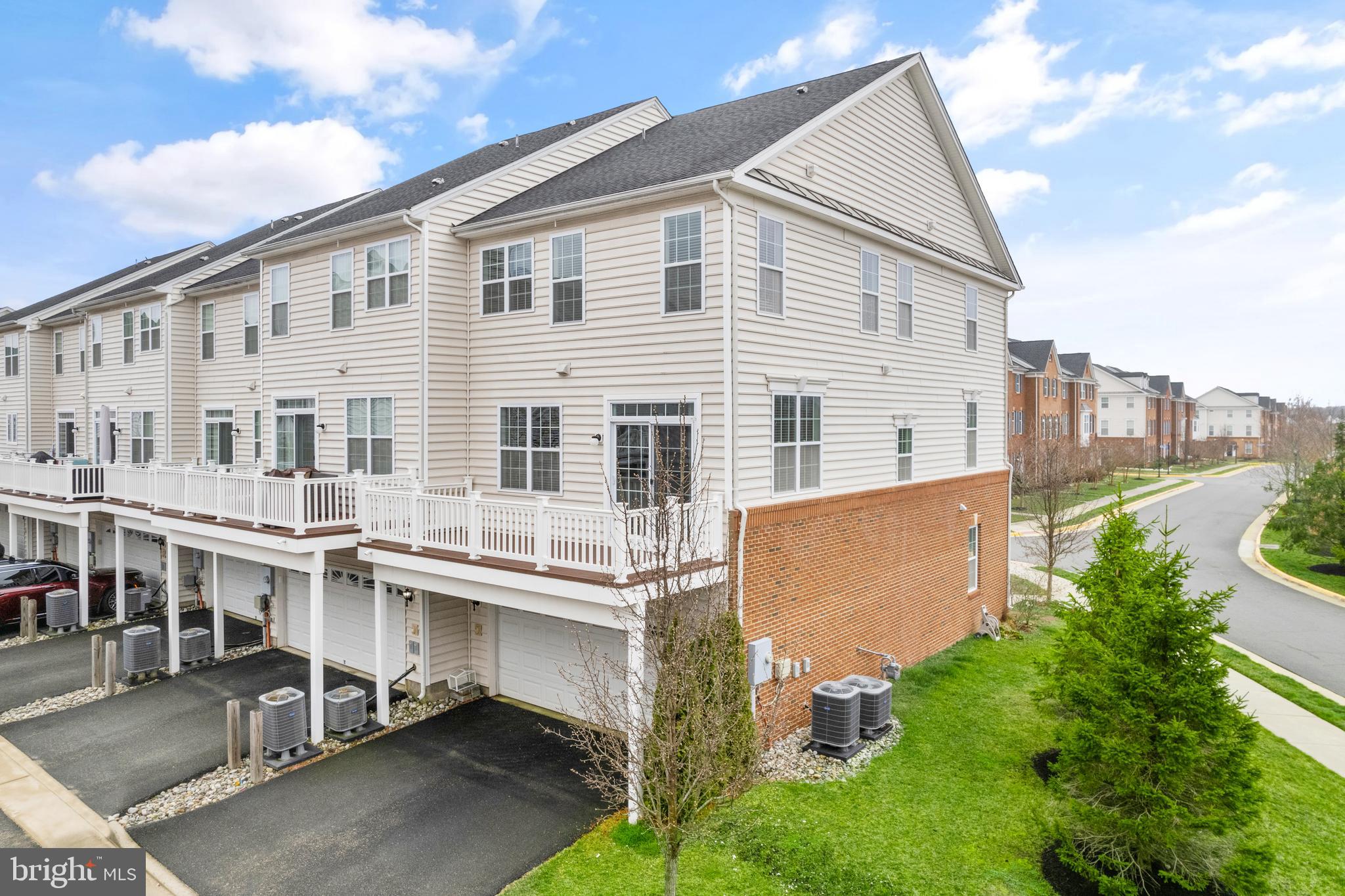 42988 Atoka Manor Terrace Ashburn, VA 20148 - Photo 47 of 47 front view of a house with a yard