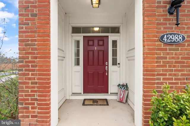 a view of an entryway door front of house