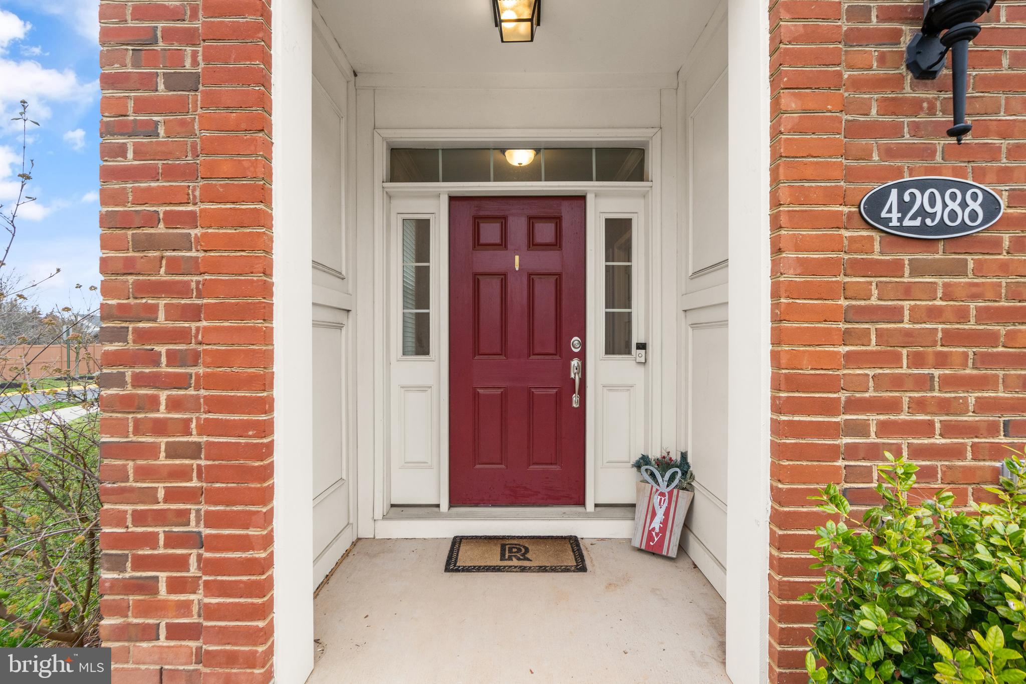 42988 Atoka Manor Terrace Ashburn, VA 20148 - Photo 5 of 47 a view of an entryway door front of house