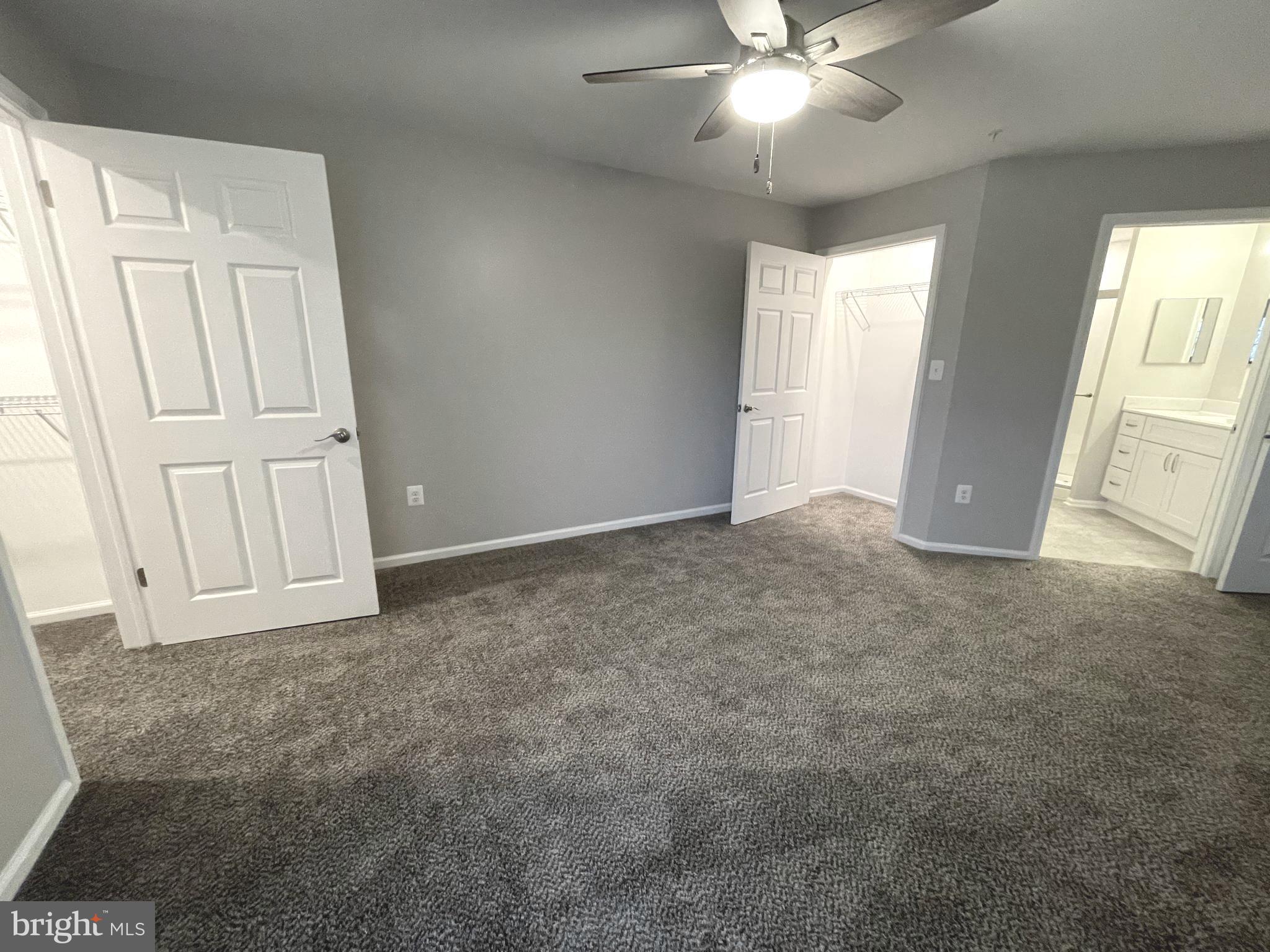 2507 Shelley Circle, Unit 42B Frederick, MD 21702 - Photo 12 of 30 an empty room with windows and fan