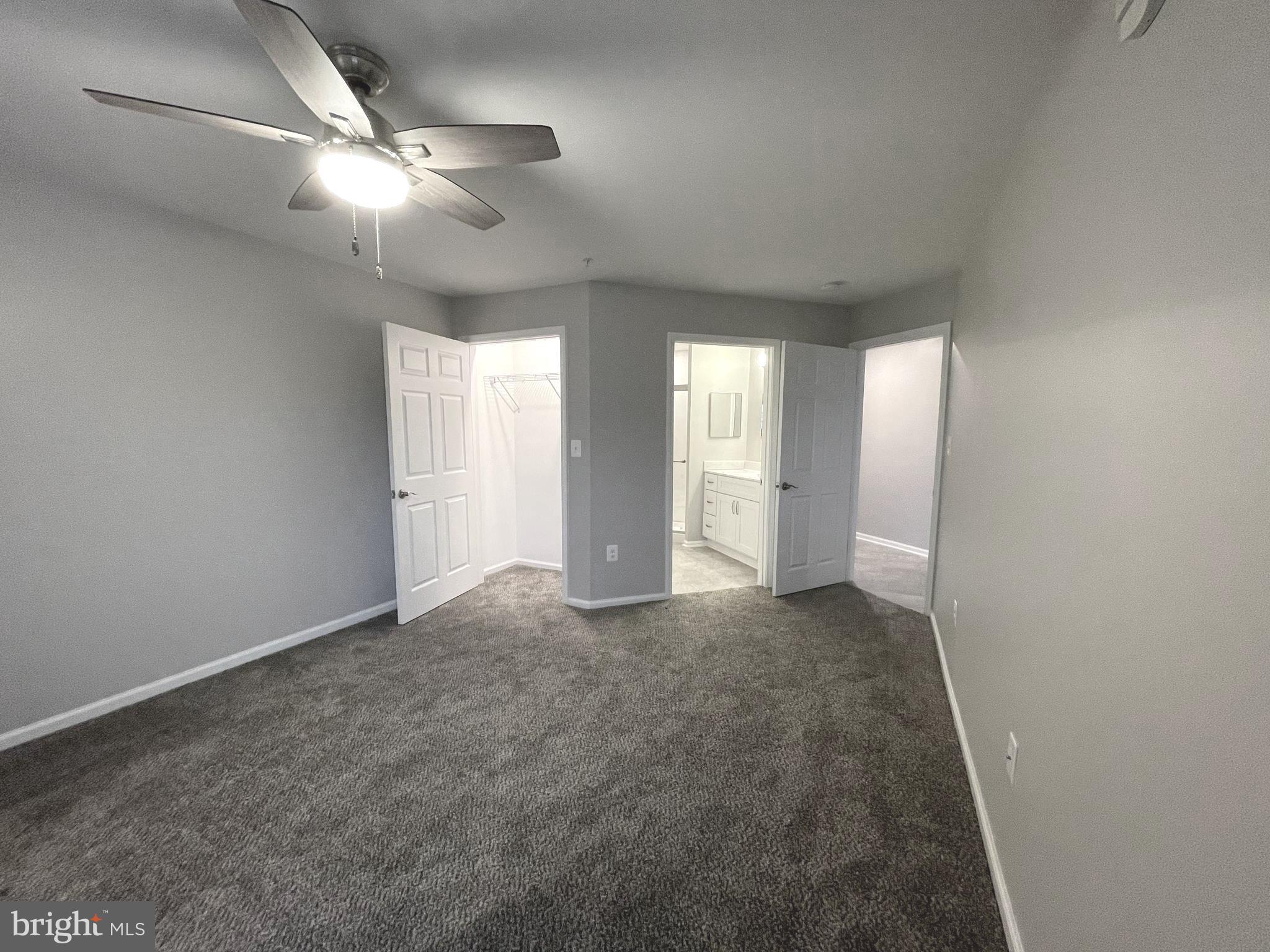 2507 Shelley Circle, Unit 42B Frederick, MD 21702 - Photo 13 of 30 an empty room with windows and fan