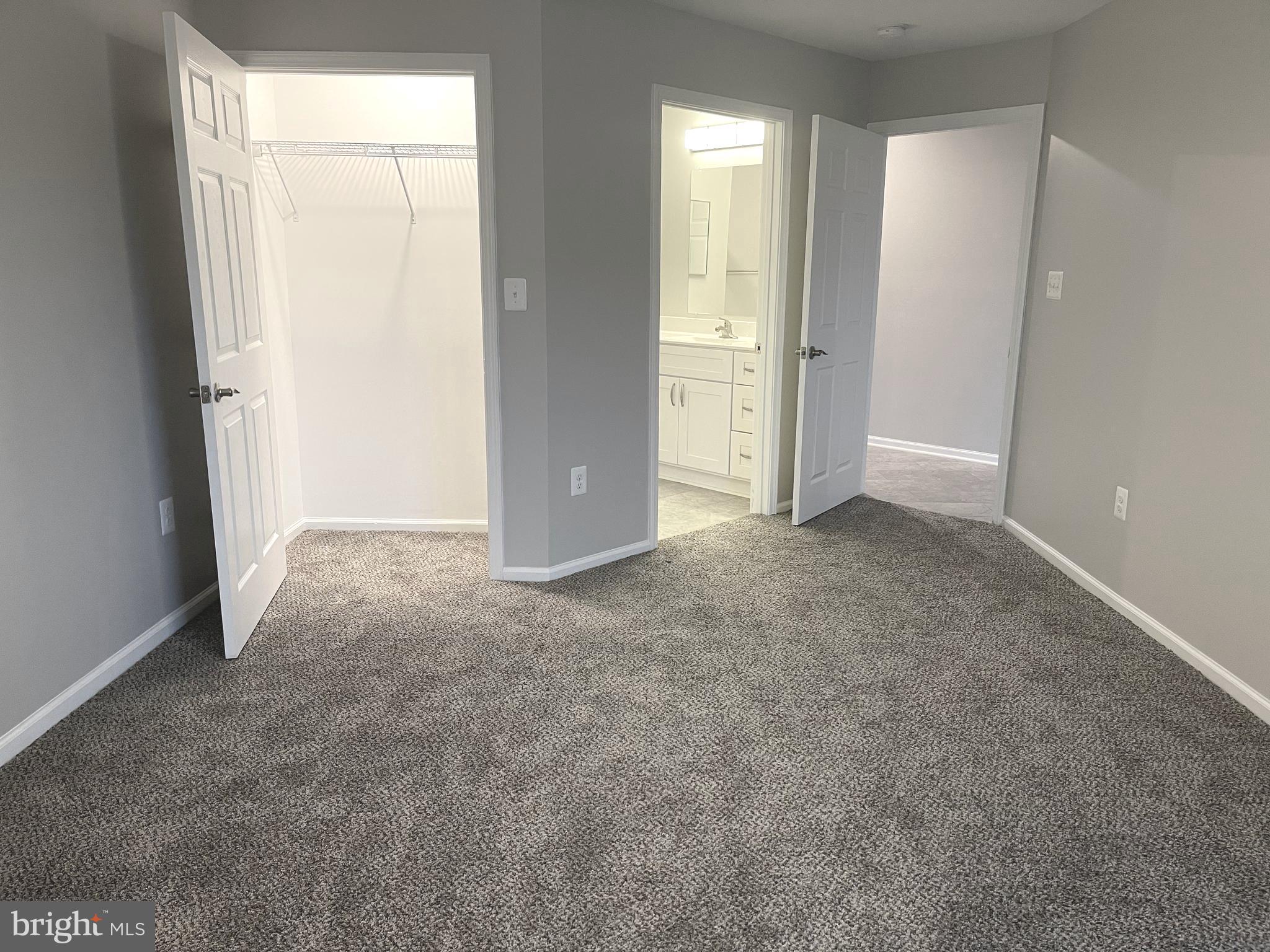 2507 Shelley Circle, Unit 42B Frederick, MD 21702 - Photo 16 of 30 an empty room with windows and closet