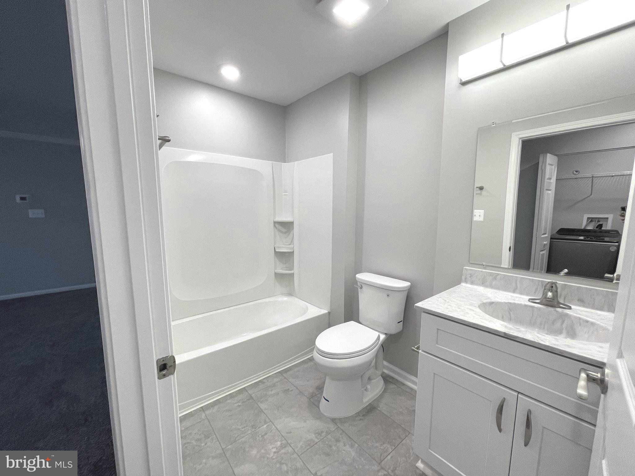 2507 Shelley Circle, Unit 42B Frederick, MD 21702 - Photo 27 of 30 a bathroom with a sink toilet and shower