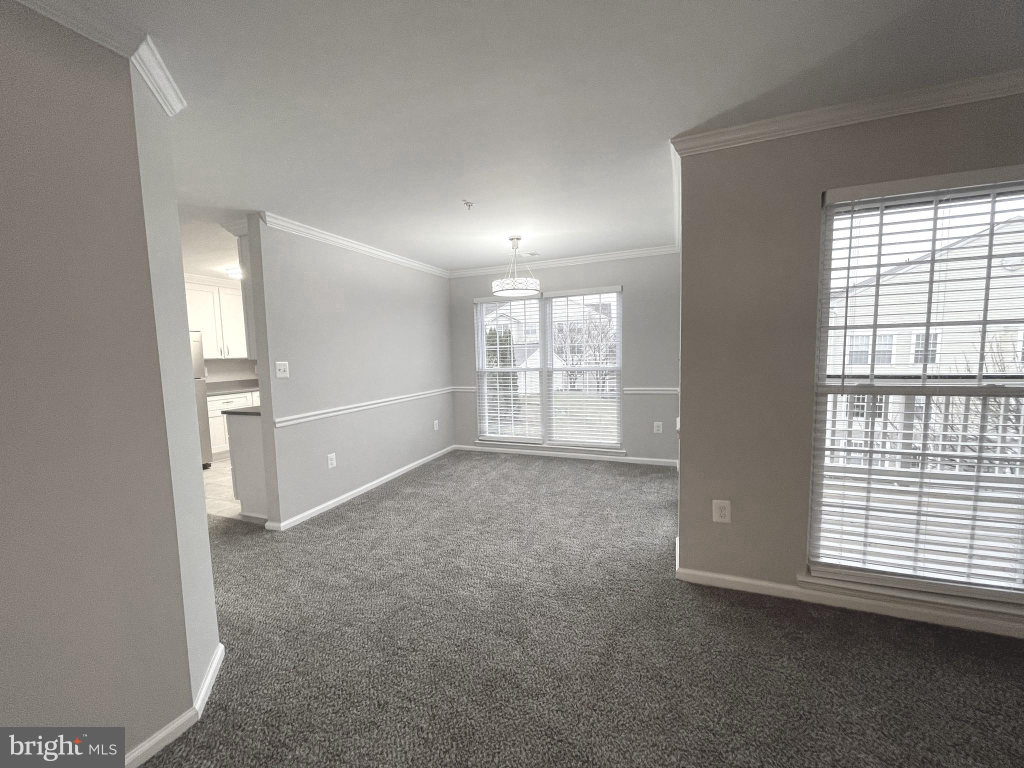 2507 Shelley Circle, Unit 42B Frederick, MD 21702 - Photo 4 of 30 an empty room with windows