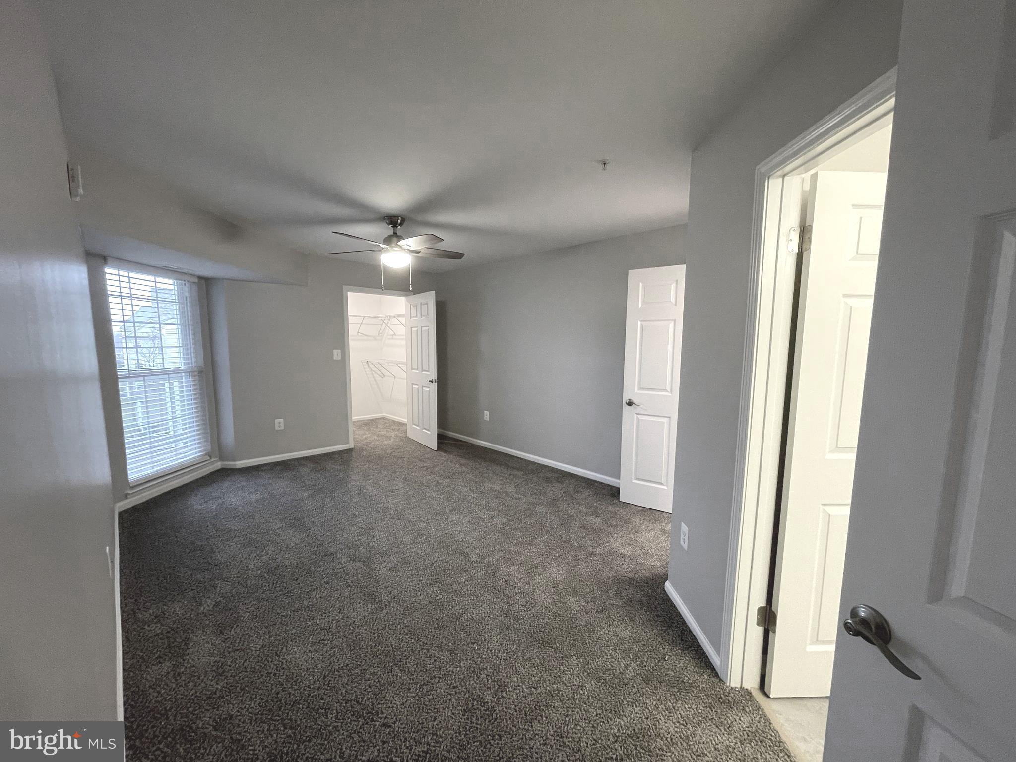 2507 Shelley Circle, Unit 42B Frederick, MD 21702 - Photo 9 of 30 a view of a livingroom with a ceiling fan and window