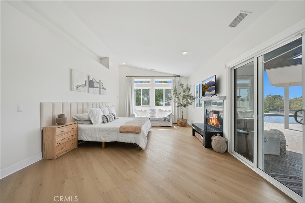 41110 Los Ranchos Circle Temecula, CA 92592 - Photo 24 of 77 a living room with furniture and a fireplace