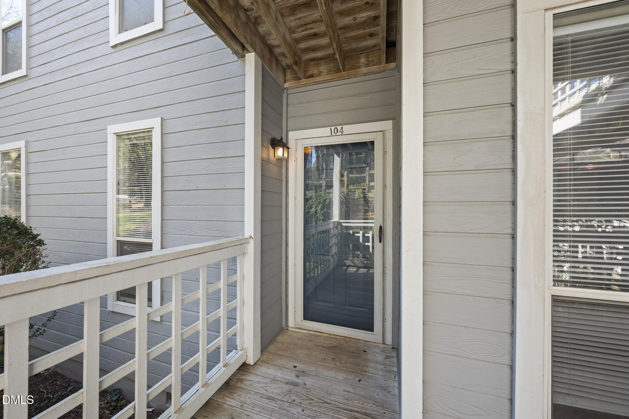 4601 Timbermill Court, Unit 104 Raleigh, NC 27612 - Photo 1 of 24 a view of a porch with wooden floor and a window