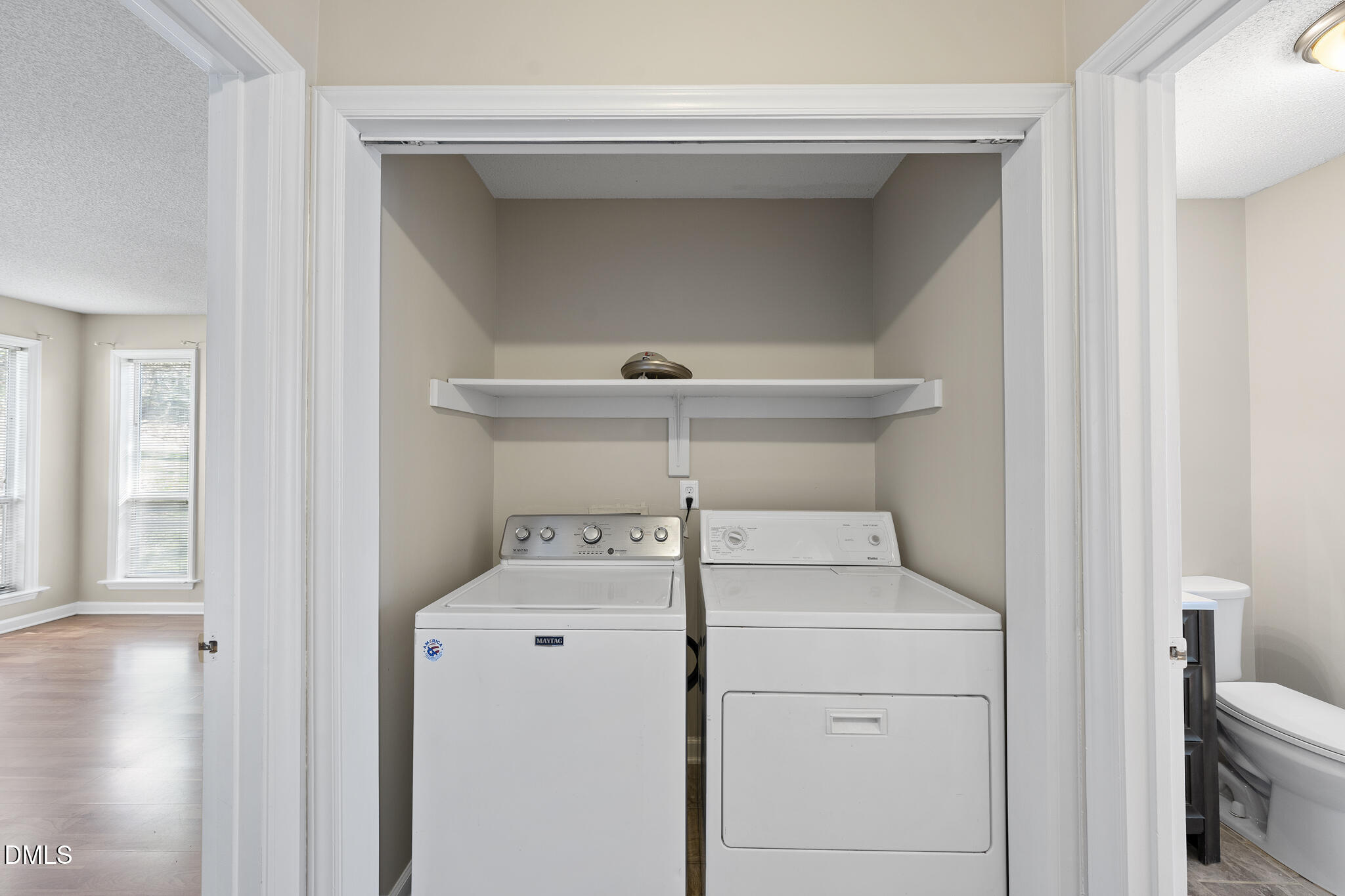 4601 Timbermill Court, Unit 104 Raleigh, NC 27612 - Photo 14 of 24 a utility room with dryer and washer