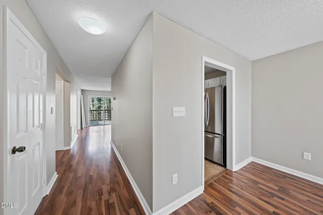 wooden floor in a hall with an entryway