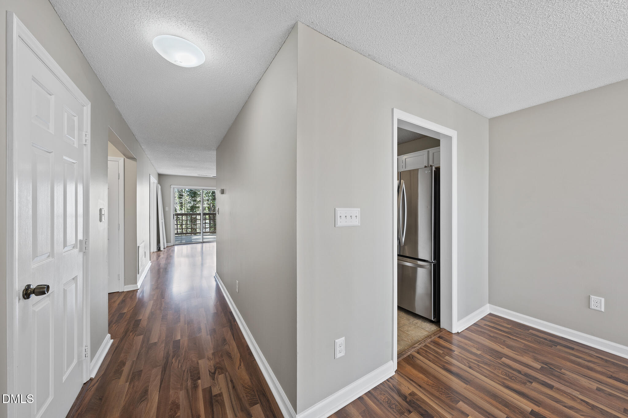 4601 Timbermill Court, Unit 104 Raleigh, NC 27612 - Photo 21 of 24 wooden floor in a hall with an entryway