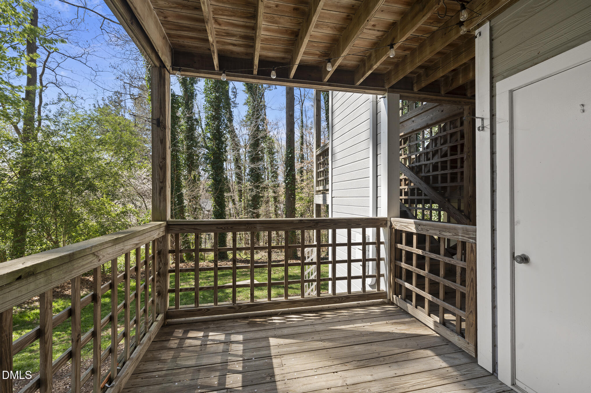 4601 Timbermill Court, Unit 104 Raleigh, NC 27612 - Photo 23 of 24 a view of a balcony with wooden floor